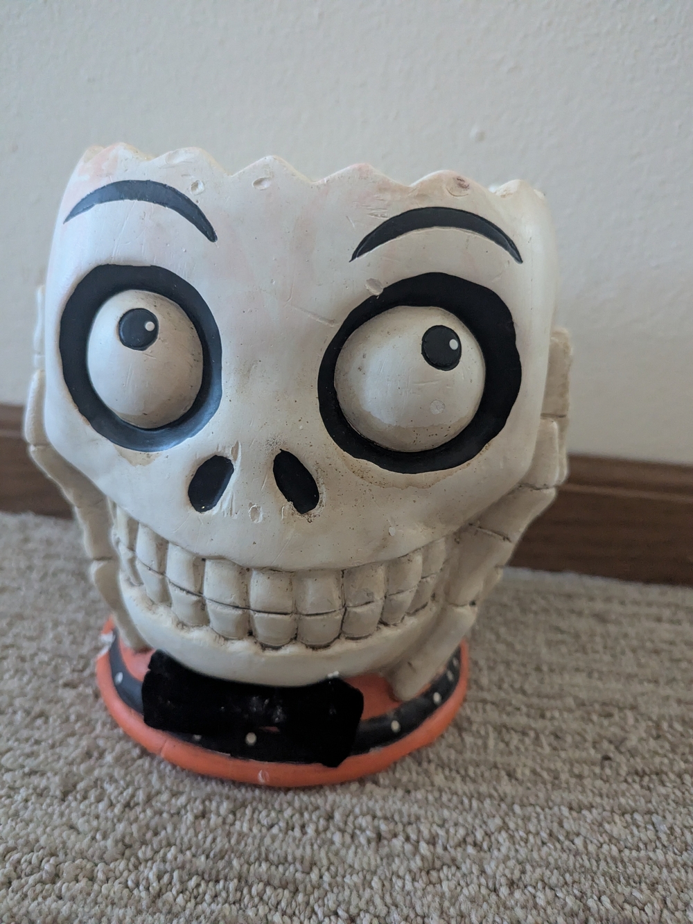 Ashland White Skull Planter with Black Facial Details and Orange Rim